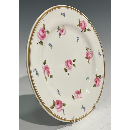 123 - A Flight Barr & Barr circular plate, painted with scattered pink roses and forget me nots, gilt band... 