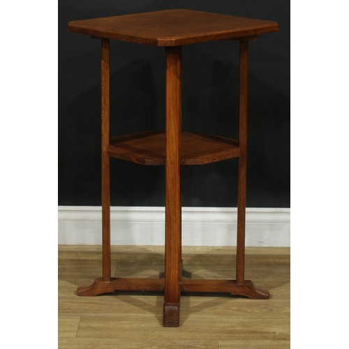 2655 - An Arts & Crafts oak occasional table, chamfered rectangular top, open undertier, X-form sledge base... 