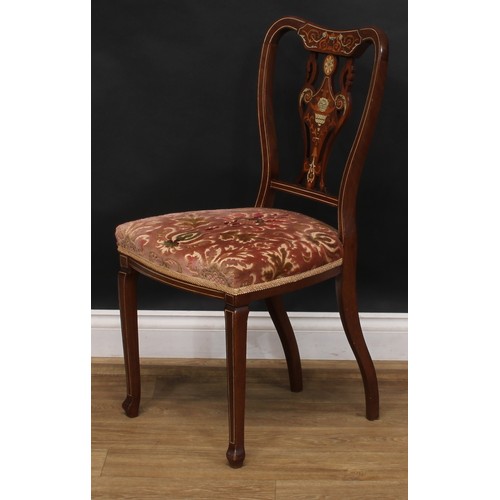 2550 - A set of four late Victorian/Edwardian mahogany, rosewood and ivorine marquetry dining chairs, by Ja... 