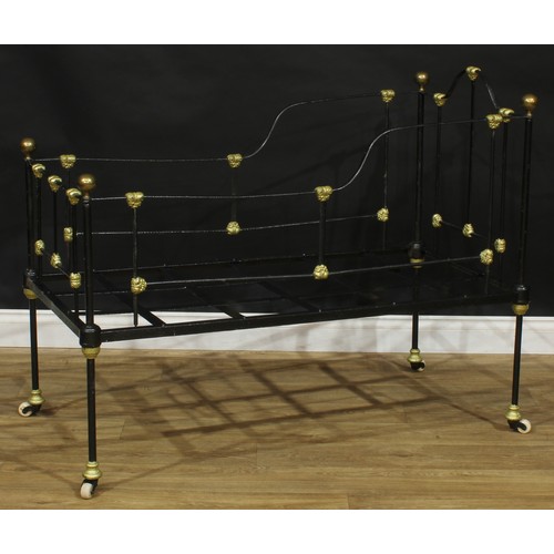 1847 - A late Victorian iron and brass child’s bed or crib, 97cm high, 123cm long, 62cm wide