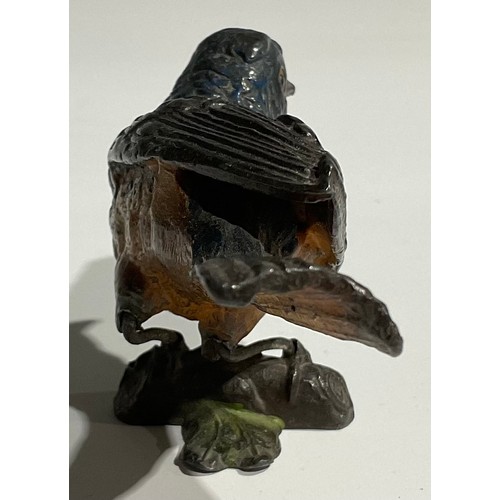 1919 - An Austrian cold painted bronze, of an owl holding a mouse in its beak, 4.5cm high, Vienna, c.1900; ... 