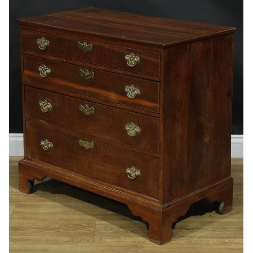 1735 - A George II oak chest, rectangular top with moulded edge above four long graduated drawers, swing ha... 