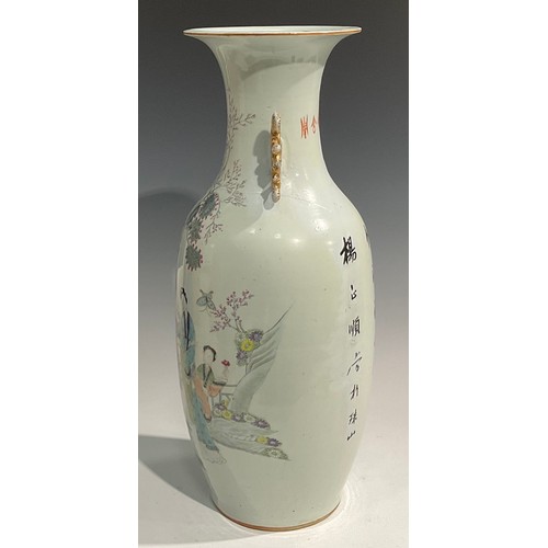 445 - A large Chinese two handled ovoid vase, painted in polychrome with ladies of the court, script to ve... 