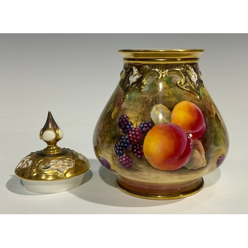 198 - A Royal Worcester lobed ovoid pot pourri vase and pierced cover, painted by J Skerrett, signed with ... 