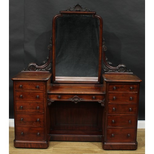 2589 - A Victorian mahogany sunken-centre dressing table, shaped rectangular mirror plate above a central f... 