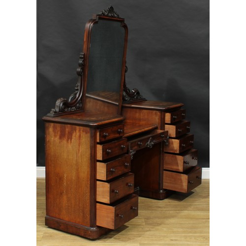 2589 - A Victorian mahogany sunken-centre dressing table, shaped rectangular mirror plate above a central f... 