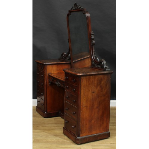 2589 - A Victorian mahogany sunken-centre dressing table, shaped rectangular mirror plate above a central f... 