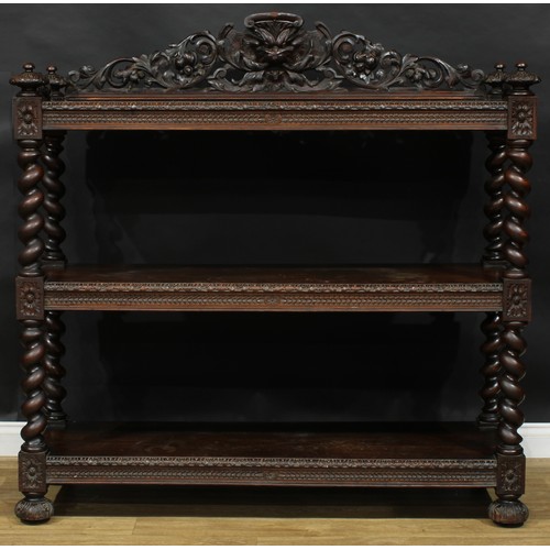 2570 - A substantial late Victorian oak buffet, of country house proportions, shaped three-quarter gallery ... 