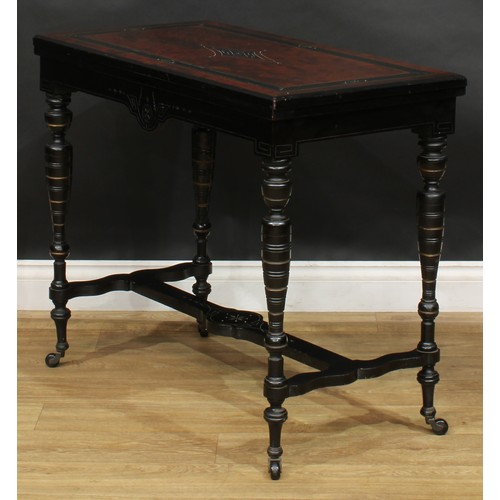 1838 - A late Victorian Aesthetic Movement amboyna and ebonised card table, hinged rectangular top enclosin... 