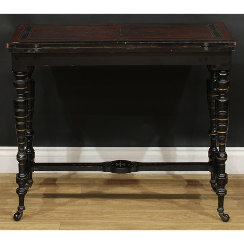 1838 - A late Victorian Aesthetic Movement amboyna and ebonised card table, hinged rectangular top enclosin... 