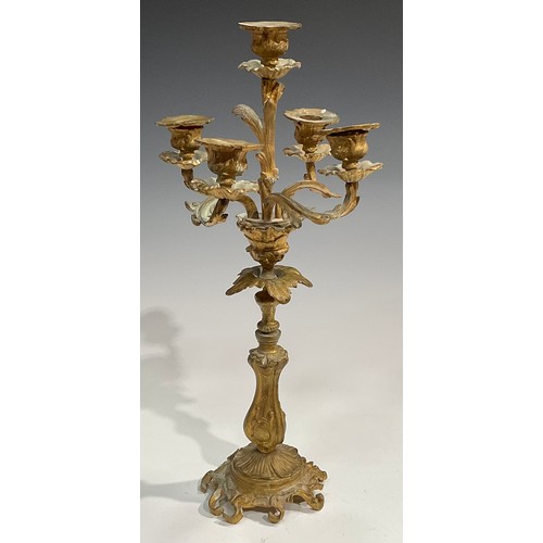 1819 - A pair of 19th century gilt metal five-light candelabra, cast throughout with acanthus in the Rococo... 