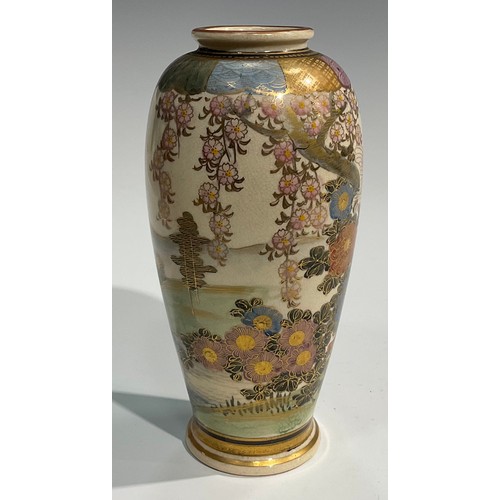 437 - A Japanese satsuma ovoid vase, painted with birds, witeria and other flowers in an extensive landsca... 