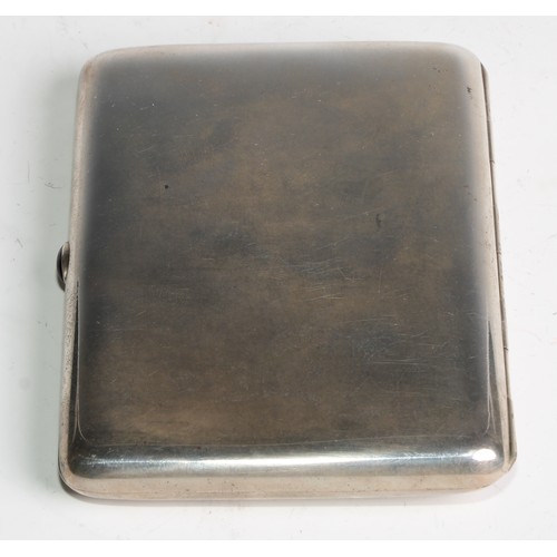 1051 - A Russian silver rounded rectangular cigarette case, the hinged cover in relief with a peacock in th... 