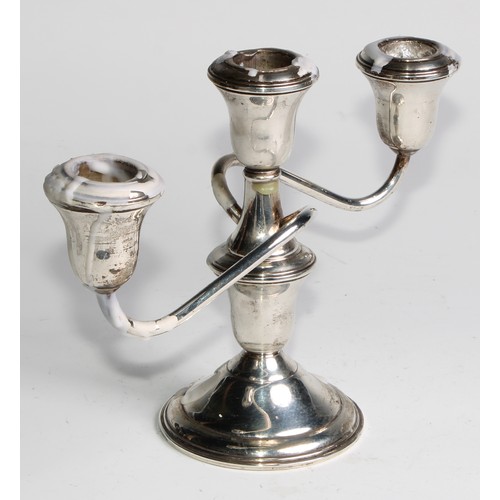 1008 - A pair of American silver three-light table candelabra, bell shaped sconces, circular bases, 24.5cm ... 