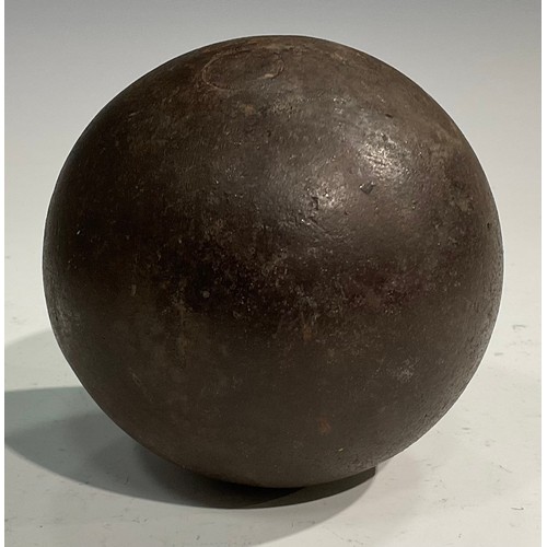 1558 - A 19th century cast iron cannonball, the collector’s stand with label inscribed Russian round shot r... 