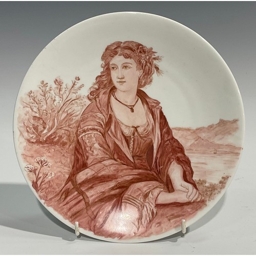 55 - A Minton's China shaped circular plate, the field painted in red sepia with the portrait of a young ... 