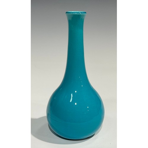 35 - A Burmantofts Faience mallet shaped vase, glazed throughout in turquoise, 21cm high, shape number 15... 