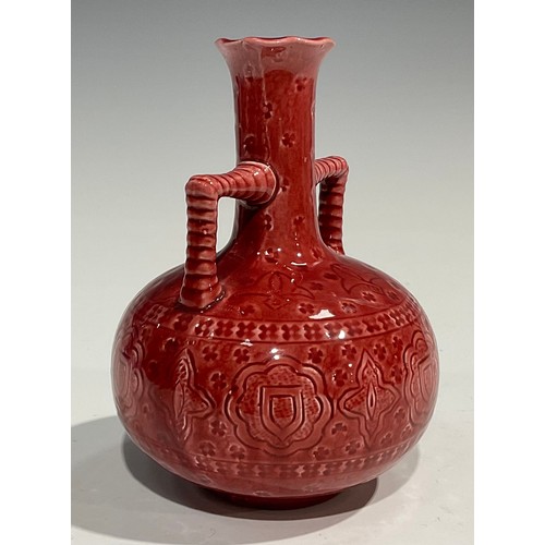44 - A Burmantofts Faience two handled globular vase, elongated neck, flared frilled rim, angular rope tw... 
