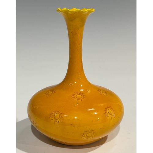 30 - A Burmantofts Faience compressed ovoid bottle vase, slender elongated neck, flared frilled rim, the ... 