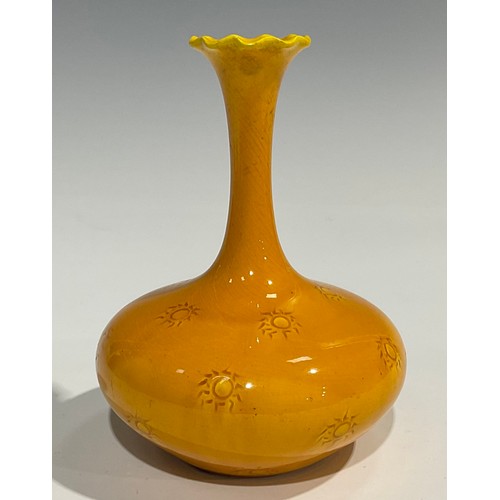 30 - A Burmantofts Faience compressed ovoid bottle vase, slender elongated neck, flared frilled rim, the ... 