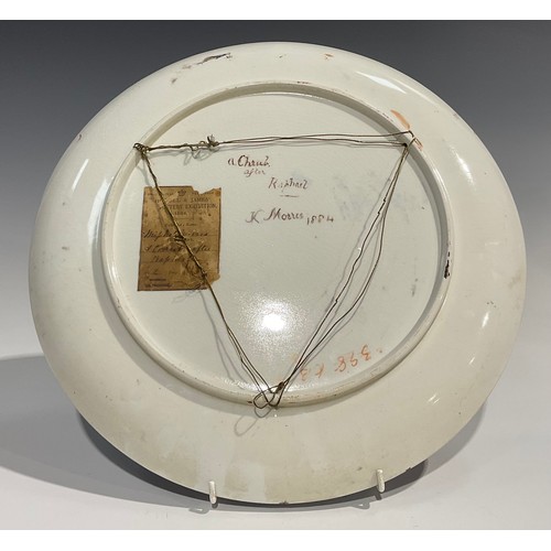 85 - The Howell & James Art Pottery Exhibition - an Aesthetic Movement circular charger, painted by Miss ... 