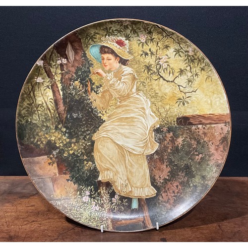 69 - An Aesthetic Movement circular charger, painted by Dona C Wheatcroft, The Foxes Mother, with Victori... 