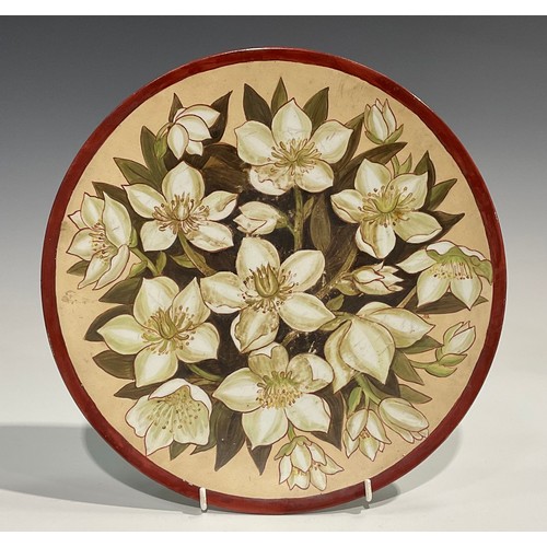 68 - An Aesthetic Movement circular charger, painted by Augusta M Reid, monogrammed AR, with stylised whi... 