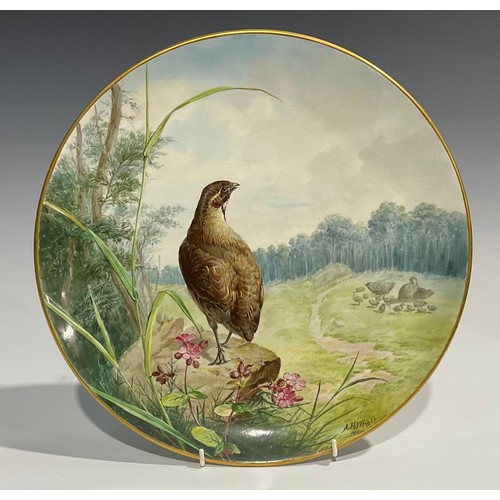 52 - A Minton Aesthetic Movement circular charger, painted by A H Wright, signed and dated 1880, with a g... 