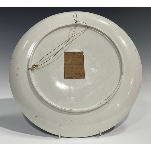 84 - The Howell & James Art Pottery Exhibition - an Aesthetic Movement circular charger, painted by Miss ... 