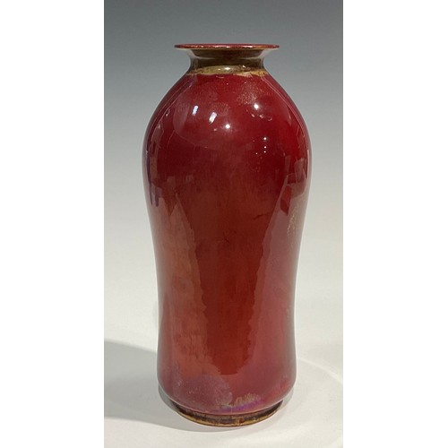 21 - A Bernard Moore flambé waisted cylindrical vase, flared rim, decorated in yellow and red lustre tone... 