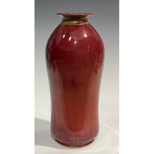 21 - A Bernard Moore flambé waisted cylindrical vase, flared rim, decorated in yellow and red lustre tone... 