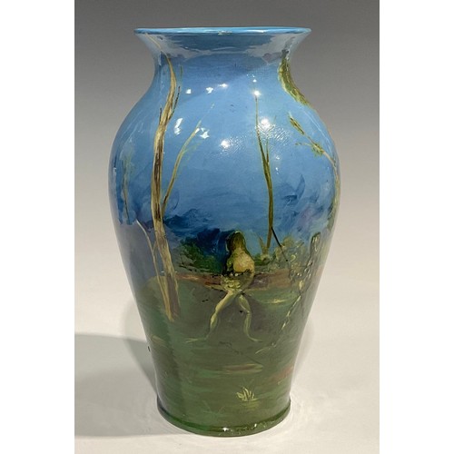 49 - A large Burmantofts Faience 'Exhibition' baluster vase, painted with two duelling frogs in woodland ... 