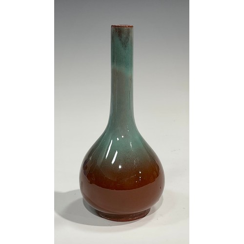 26 - A Buller's Art Pottery ovoid vase, glazed throughout in bronze lustre, 22cm high, printed marks; a J... 