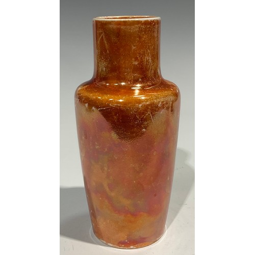 64 - A Ruskin lustre shouldered vase, glazed throughout in mottled tones of orange, 16.5cm high, impresse... 