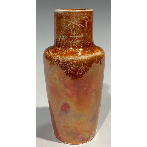 64 - A Ruskin lustre shouldered vase, glazed throughout in mottled tones of orange, 16.5cm high, impresse... 