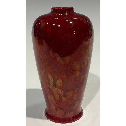 64 - A Ruskin lustre shouldered vase, glazed throughout in mottled tones of orange, 16.5cm high, impresse... 