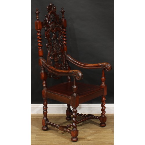 2303 - A William & Mary Revival open armchair, shaped back carved with a flowering campana urn and scrollin... 