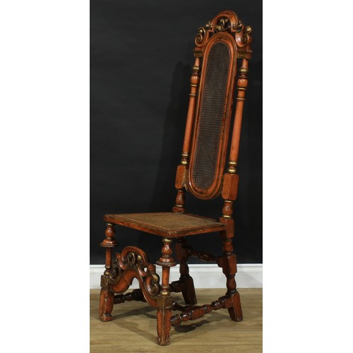 2304 - A William & Mary Revival painted and parcel-gilt chair, shaped cresting curbed with scrolling leaves... 