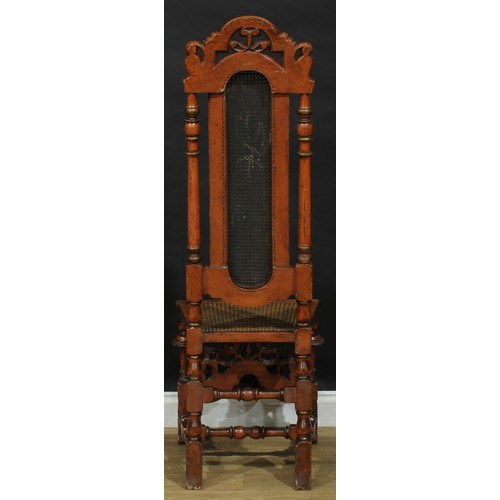 2304 - A William & Mary Revival painted and parcel-gilt chair, shaped cresting curbed with scrolling leaves... 