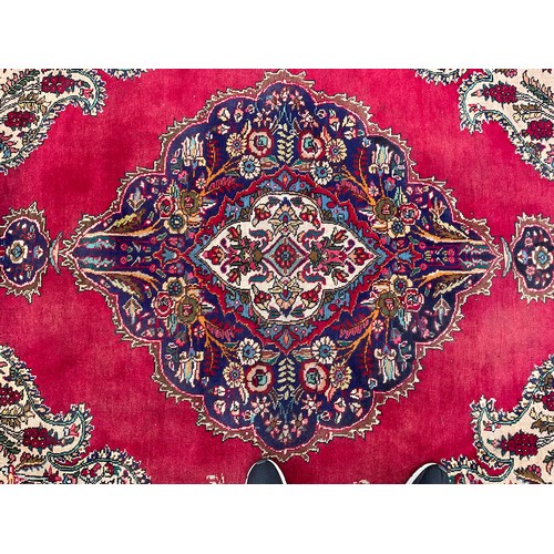 1773 - A Persian Kerman type wool rug or carpet, worked in the traditional manner, 278.5cm x 207.5cm