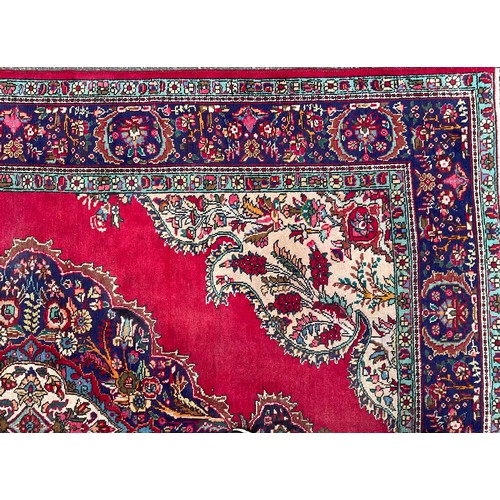 1773 - A Persian Kerman type wool rug or carpet, worked in the traditional manner, 278.5cm x 207.5cm