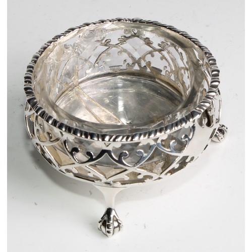 1031 - A pair of large early George III silver salts, gadrooned and pierced borders, ball and claw feet, as... 