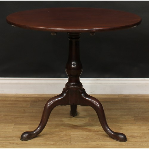 1742 - A George III mahogany tripod occasional table, one-piece circular tilting top, turned column, cabrio... 