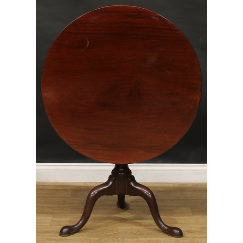 1742 - A George III mahogany tripod occasional table, one-piece circular tilting top, turned column, cabrio... 