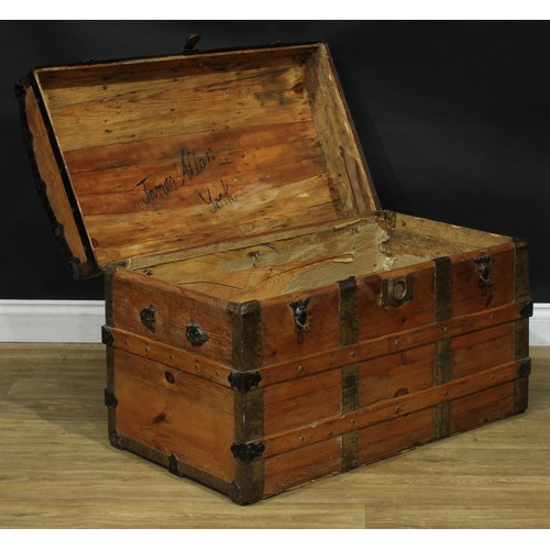 1911 - An early 20th century metal-bound pine dome top steamer trunk, 63.5cm high, 93cm wide, 52cm deep