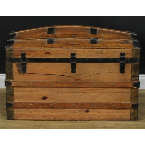 1911 - An early 20th century metal-bound pine dome top steamer trunk, 63.5cm high, 93cm wide, 52cm deep