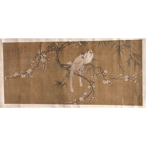 385 - A Chinese scroll painting, Birds on a Blossoming branch, inscribed with verse, red seal marks, ink M... 