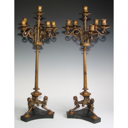 2532 - A pair of tall 19th century French bronze five-light candelabra, in the Grand Tour taste, half-flute... 