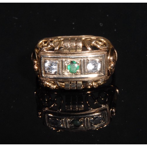 1403 - A late 19th century three stone diamond and emerald ring, stamped '585' for 15ct gold, the central r... 