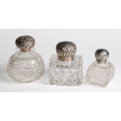 996 - A large Victorian silver mounted glass inkwell, the hinged domed cover chased with flowers and scrol... 